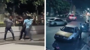 unos hombres peleando en una calle y una camioneta arrollando personas