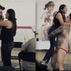 Hombre con poca ropa bailando junto a una mujer en un salón de fiestas.