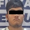 Rostro de un hombre cubierto con cinta negra y presentado ante la Fiscalía de Puebla.