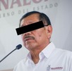 Gerardo N detenido y con su rostro cubierto