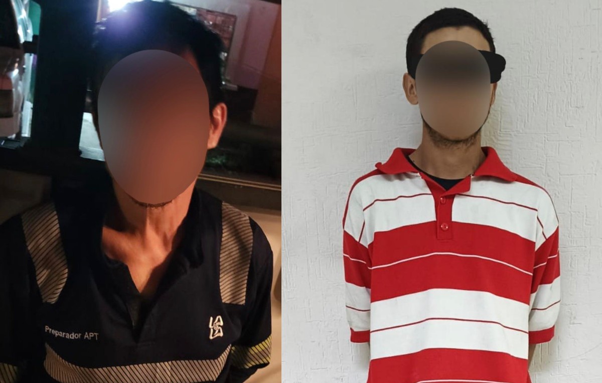 Dos hombres con cara censurada siendo aprendidos por intento de robo