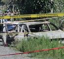 Auto calcinado en Amozoc junto a un cadáver en las mismas circunstancias.