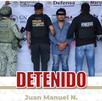 un hombre detenido rodeado de policías y militares