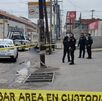 Hombre muerto sobre pavimento