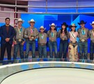 Equipo de Rodeo de Nuevo León en las instalaciones de Multimedios.