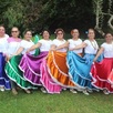 Mujeres con vestidos de danza para el festival en Huauchinango