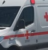 Ambulancia que atendió el reporte de un hombre muerto al exterior de una tienda en Gómez Palacio.