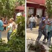 una mujer agrede a un hombre dentro de una escuela mientras otras personas intervienen para controlar la situación