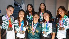 Atletas poblanos con medalla al cuello y uniformes de la Olimpiada Nacional Conade 2026