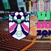 Logo del evento Zona Fan Vibra Jalisco con una foto del interior del Auditorio Benito Juárez desenfocado en el fondo