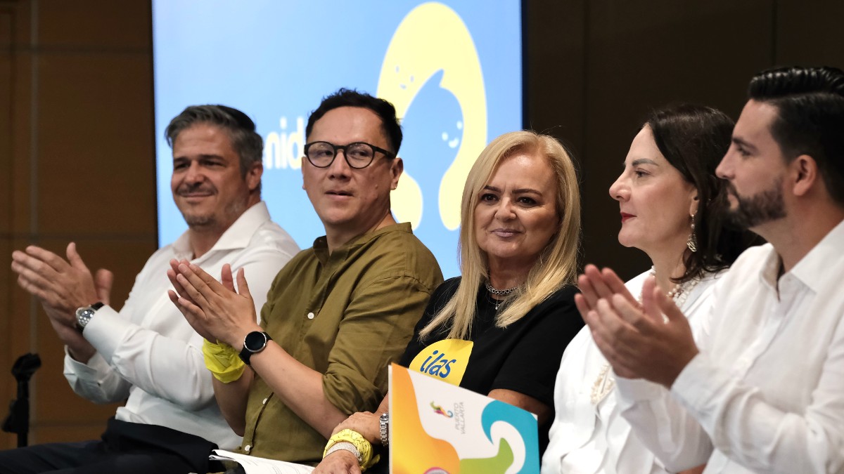 Personas sentadas en un aforo