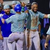 Jugadores de Charros festejando una carrera en el Estadio Panamericano