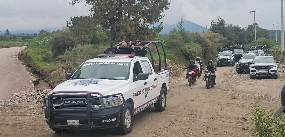 Policía en calles de San Miguel Canoa.