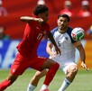 Jugadores de Canadá y Bosnia durante su partido en el Mundial 2026.