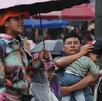 Personas con paraguas por lluvias en CdMx