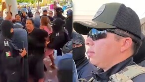 Mujer siendo detenida por policías durante una protesta en Acatlán de Osorio, Puebla.