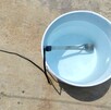 Cubeta de agua con una resistencia eléctrica