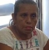 Mujer con vestido oaxaqueño en una fotografía.