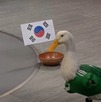 Merlín el pato haciendo pronóstico entre México y Corea del Sur