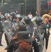 Un grupo de aficionados dio un portazo en el Fan Fest de Monterrey tras el cierre de accesos por sobrecupo; Fuerza Civil utilizó gas para disuadir.