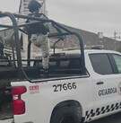 Camioneta en color blanco de la Guardia Nacional