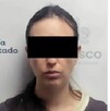 Ficha de sentencia de la Fiscalía de Jalisco de Aurora 'N' con una fotografía de la mujer con los ojos censurados con un recuadro negro