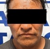 Hombre adulto con los ojos tapados detenido en la Fiscalía de Oaxaca.
