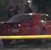 Personas muertas a balazos a bordo de un Ferrari