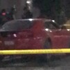 Personas muertas a balazos a bordo de un Ferrari