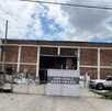 Fiscalía de Jalisco resguarda el sitio cateado en la colonia El Álamo en Guadalajara.