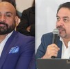 Dos hombres vestidos de traje hablando ante el público.