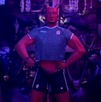Demonio con playera de la Selección Mexicana junto con 11 veladoras.