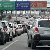 fila de carros por trafico rumbo a caseta Guadalupe