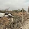 Auto volcado en avenida Fidel Velázquez en Escobedo.