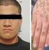 Mano tatuada y rostro de un hombre detenido en Veracruz.