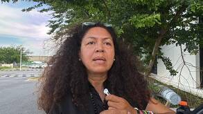 Mujer, madre de joven asesinado