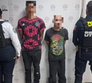 Una foto de los dos masculinos detenidos y la Policía de Morelia