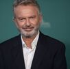 Sam Neill llega al estreno de 
