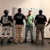 Luis Fidel ‘N' con a cara censurada siendo detenido por agentes de la Fiscalía de Michoacán, Guardia Nacional, Ejército Mexicano y Guardia Civil