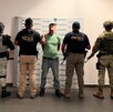 Luis Fidel ‘N' con a cara censurada siendo detenido por agentes de la Fiscalía de Michoacán, Guardia Nacional, Ejército Mexicano y Guardia Civil