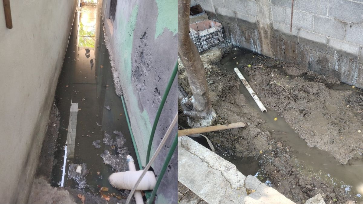 Para evitar que el agua con desechos ingresara a su domicilio, habitantes tuvieron que romper el piso de sus patios. | Israel Santacruz
