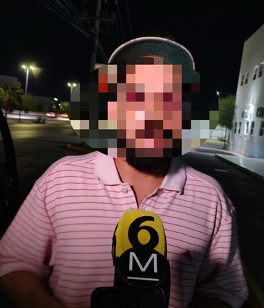 Mientras alimentaba a los canes, objetos como piedras y botellas de vidrio comenzaron a caer en el área de la cochera.