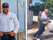 David Escalante, director de Prolimpia, y un trabajador del Sistema Municipal de Agua Potable y Alcantarillado de Progreso peleando