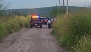 El fallecido presentaba heridas producidas por arma de fuego, además de otros indicios de violencia.