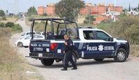 Elementos de seguridad resguardan el cruce de la 145 Poniente y la calle Del Trabajo en Puebla