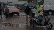 Una motociclista murió tras ser embestido por un Tesla color rosa en Periférico Sur.