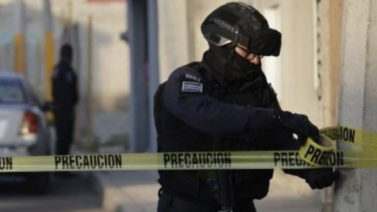 Elementos de seguridad acordonaron un taller de hojalatería en la colonia La Loma, Puebla | Archivo