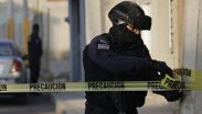 Elementos de seguridad acordonaron un taller de hojalatería en la colonia La Loma, Puebla | Archivo