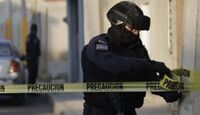 Elementos de seguridad acordonaron un taller de hojalatería en la colonia La Loma, Puebla | Archivo