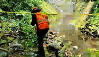 Elementos del Escuadrón Nacional de Rescate y Protección Civil ejecutan maniobras con cuerdas y camillas rígidas para extraer el cuerpo